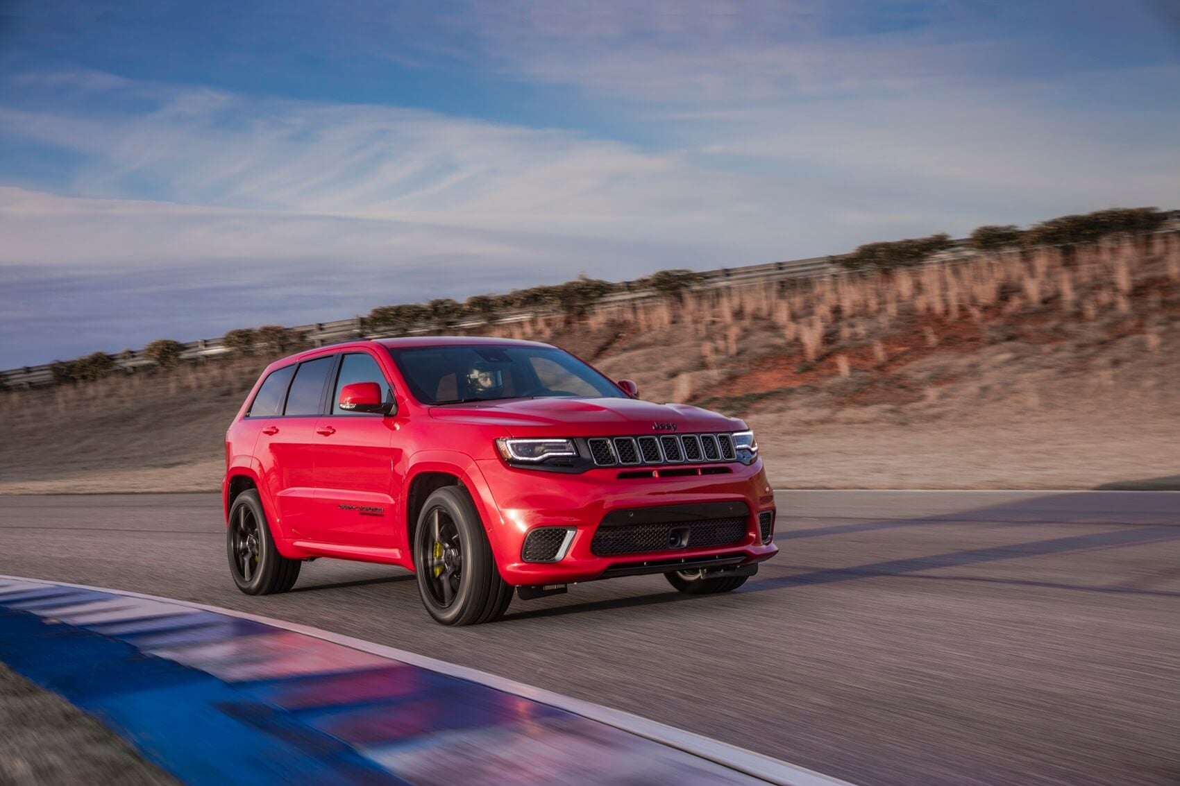 Jeep Grand Cherokee in Red on Track Front
