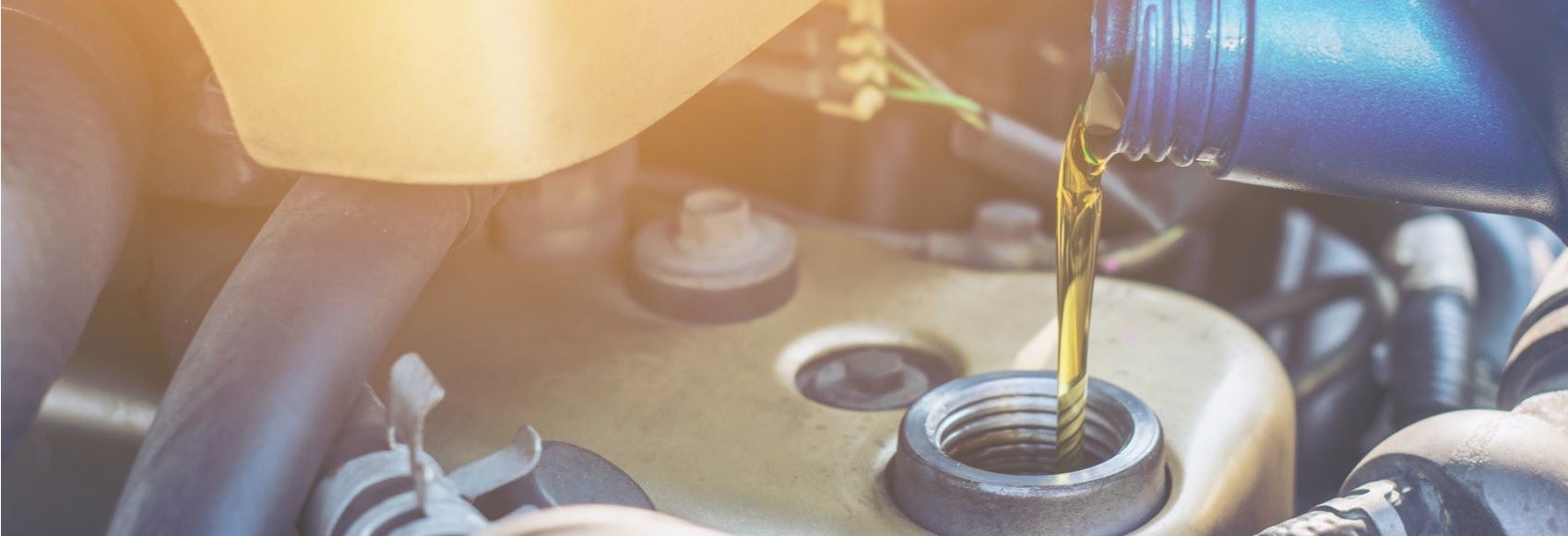 Oil Pouring into Engine Snipped